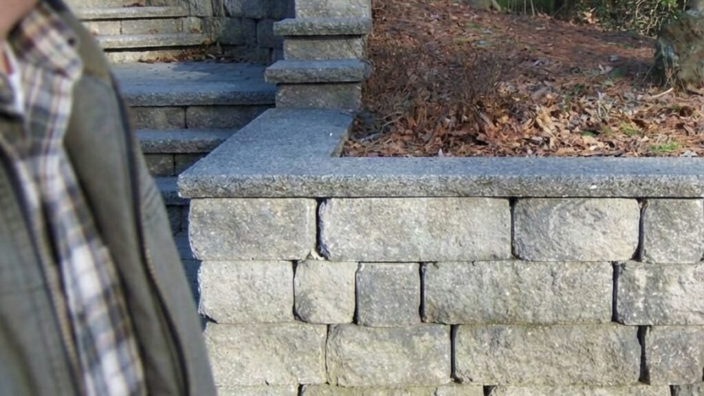 Stone Block Retaining Wall Near Me on Sloped Yard