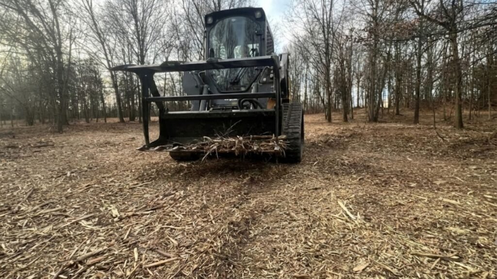 Tracked Skid Steer on Newly Cleared Residential Expansion Area