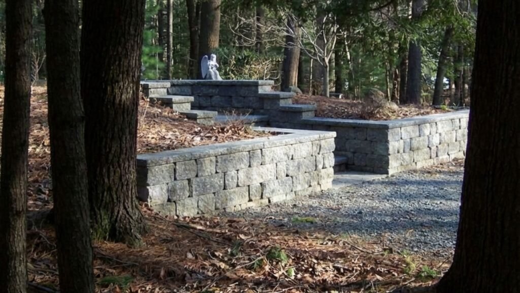 Multi Level Stone Retaining Wall Nearby in Forested Yard