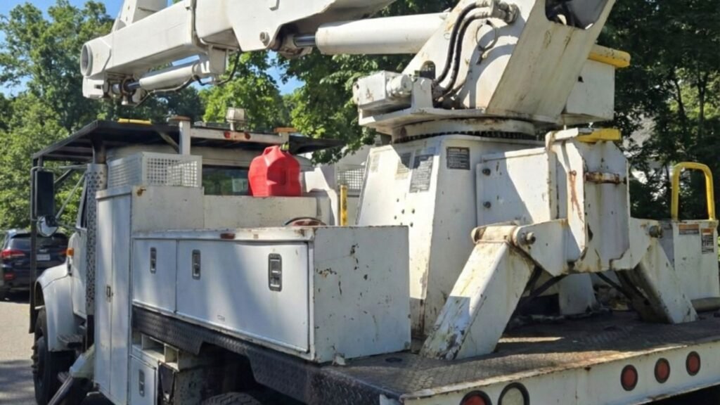 Stabilized Bucket Truck Ready for Tree Service Work in Monroe Connecticut