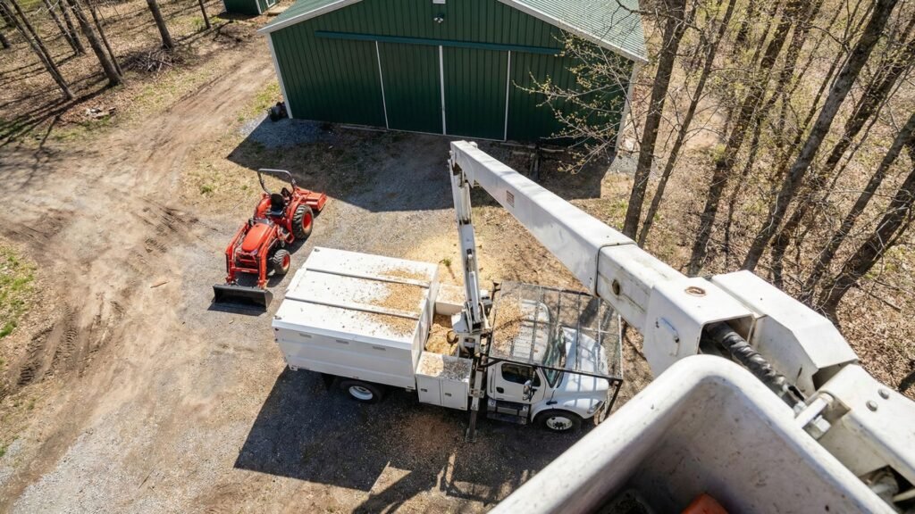 Overhead view of tree removal equipment operating on a residential property in Roxbury Connecticut