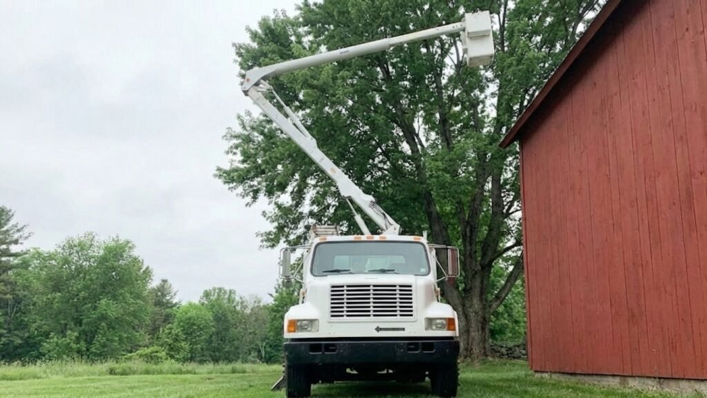 Bucket Truck Positioned for Tree Services Near You in Oxford Connecticut